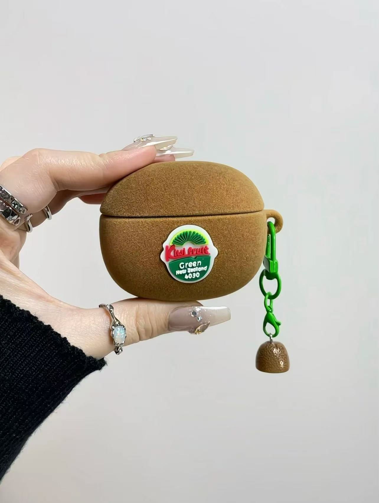 Velvety kiwi creative earphone case for AirPods with a cute matching kiwi charm.