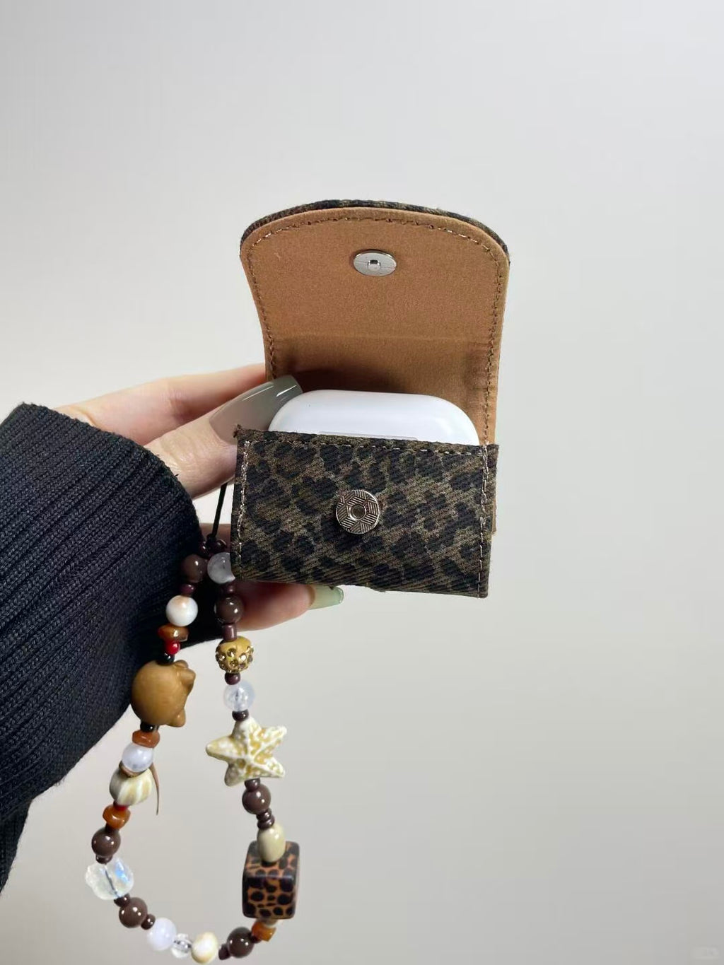 Maillard caramel leopard print flip cover earphone case carrying bag opened