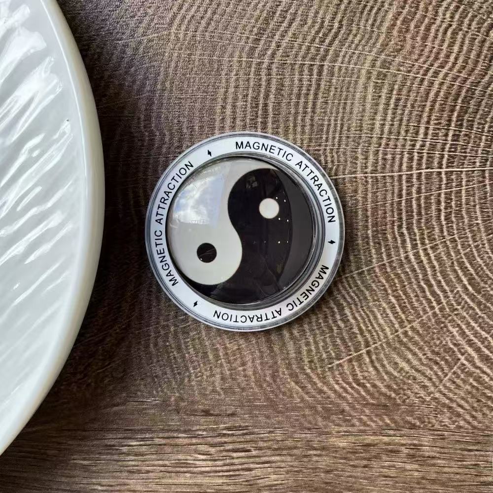 Taiji Yin-Yang magnetic retractable phone stand